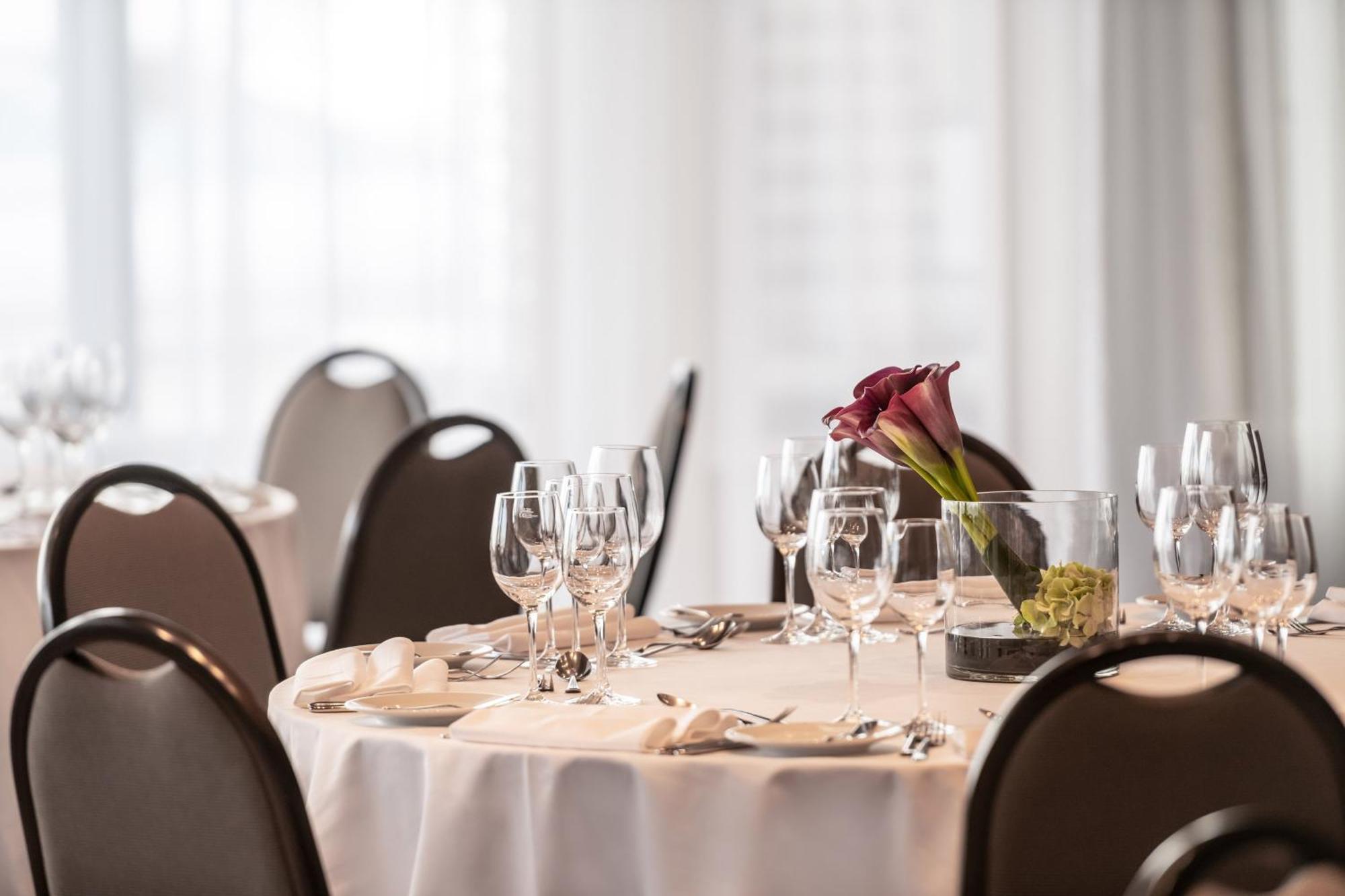 The Westin Grand Munich Hotel Exterior photo A table set for a formal dinner